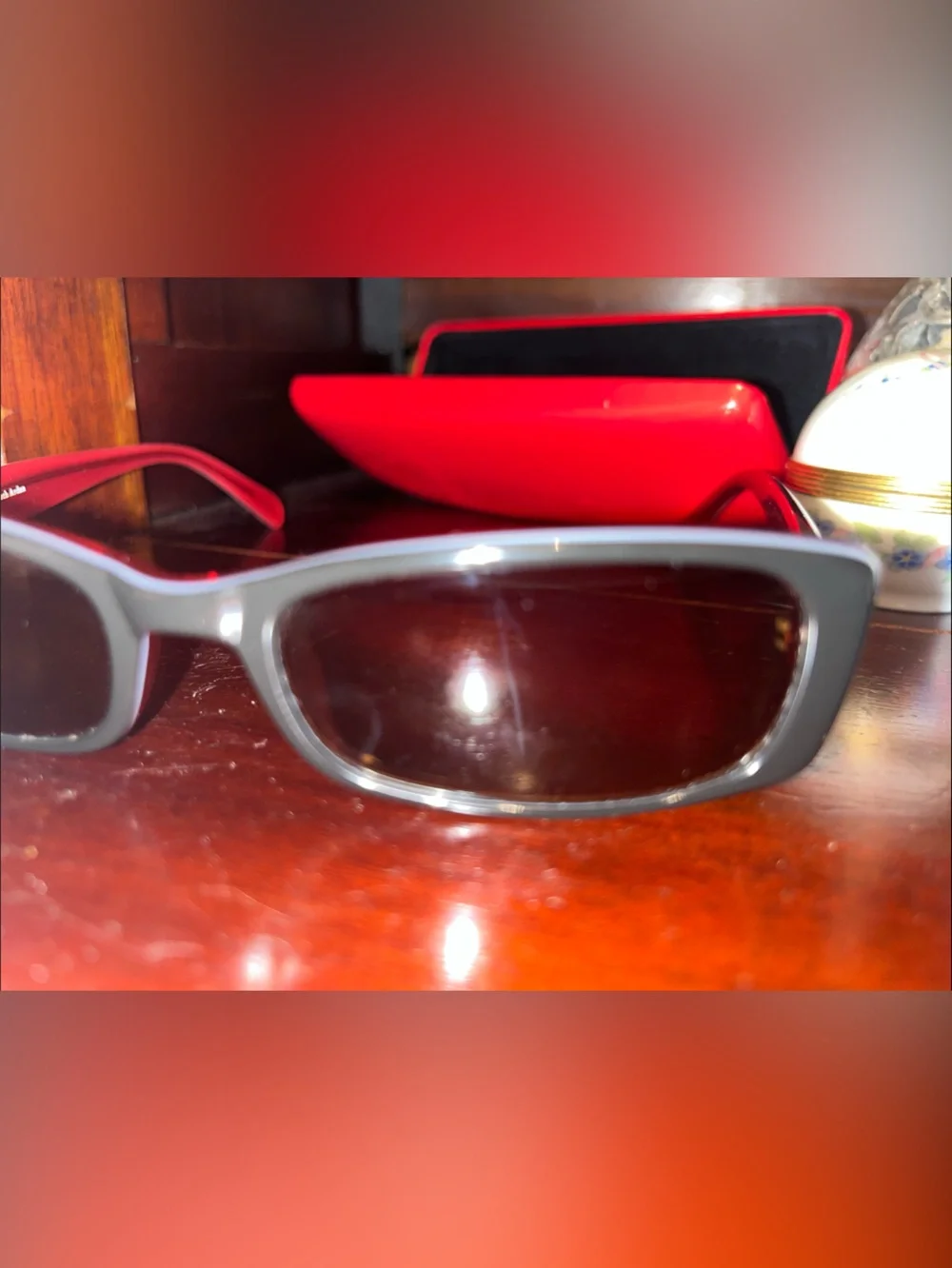Elizabeth Arden Black Rectangular Sunglasses with Red Accents